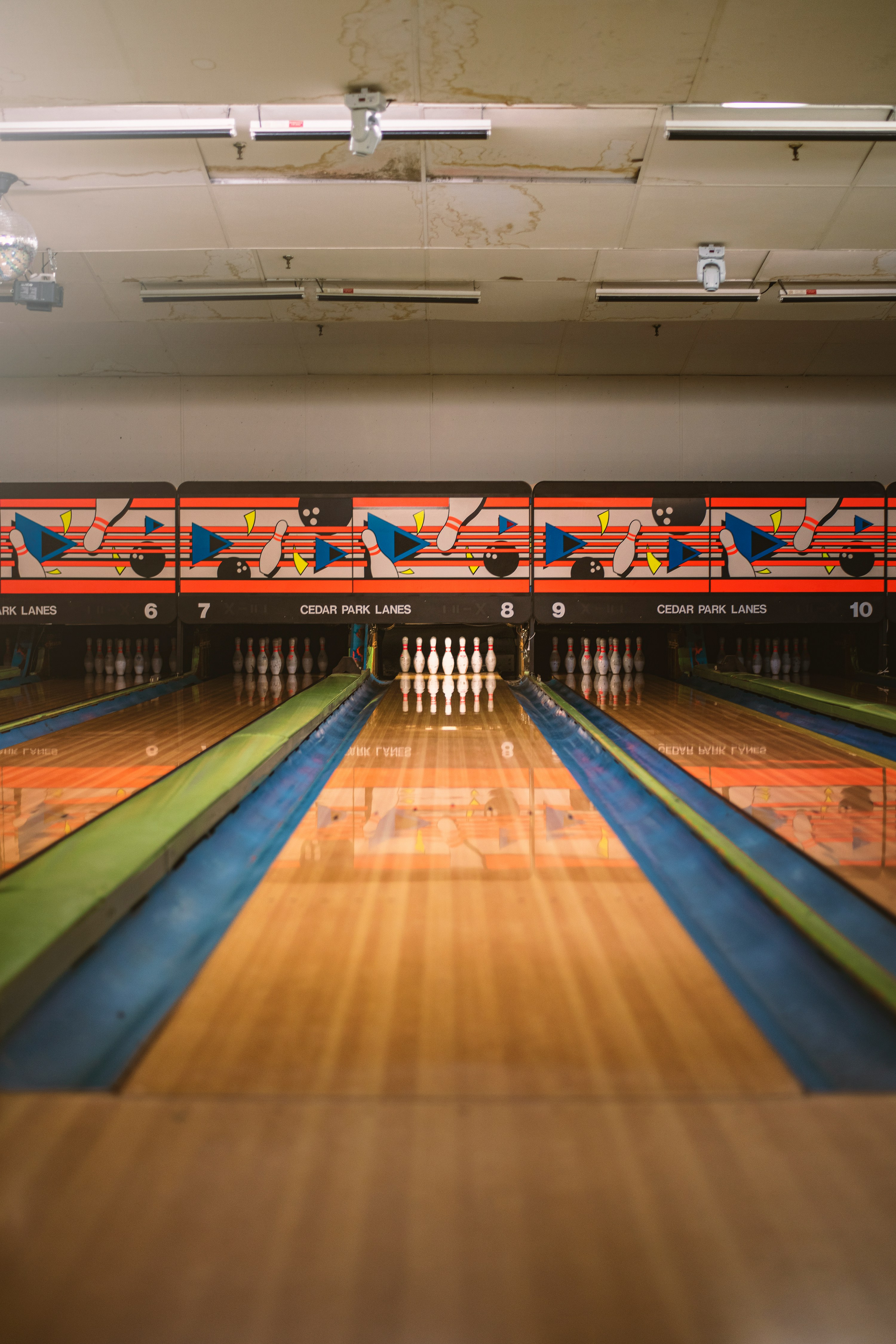 Vintage bowling lanes with retro masking units